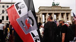 QAnon Flag being waved at a Anti-Lockdown protest in Berlin